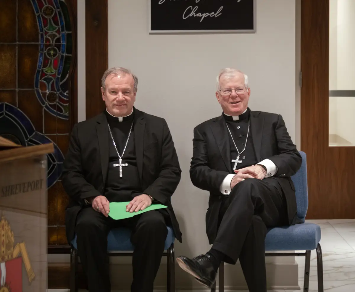 Bishop Robert Marshall, Apostolic Administrator and Bishop Emeritus Francis Malone of the Diocese of Shreveport, seated at a press conference announce Bishop Malone's retirement and Bishop Marshall's appointment.